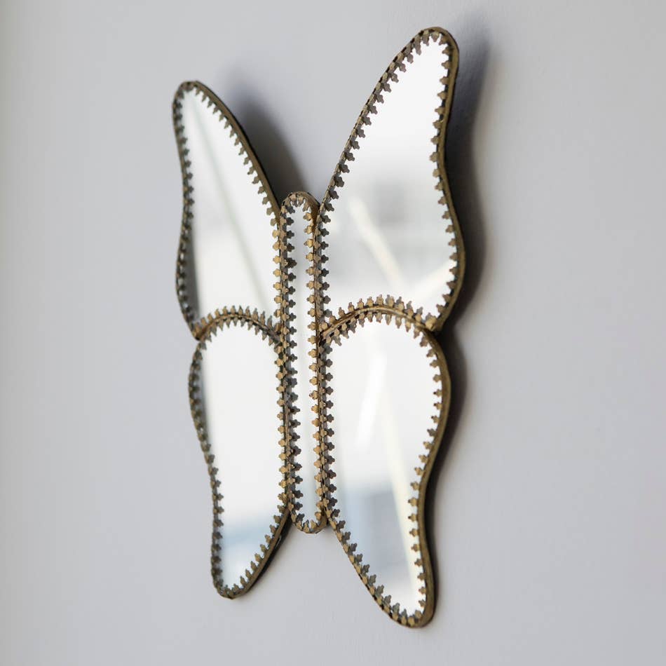 Miroir en forme de papillon avec détails en laiton